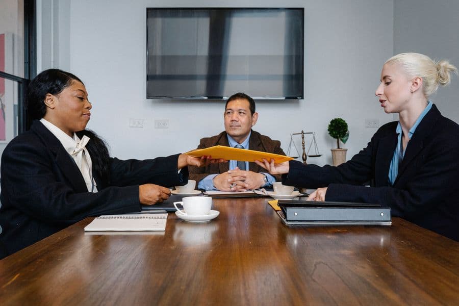 Service firm team meeting around a table