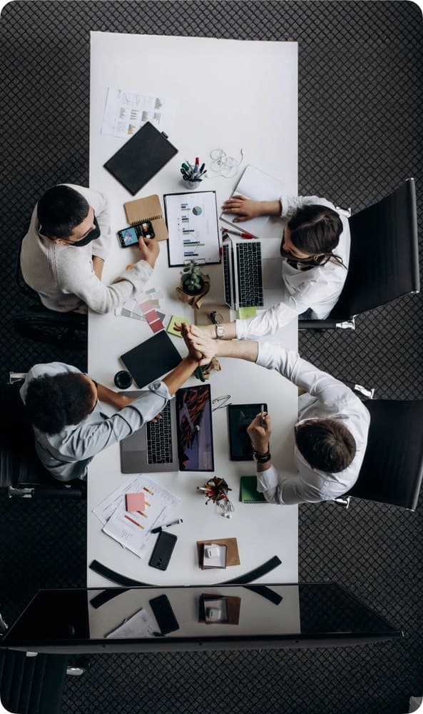 Miivo expert team collaborating around a table