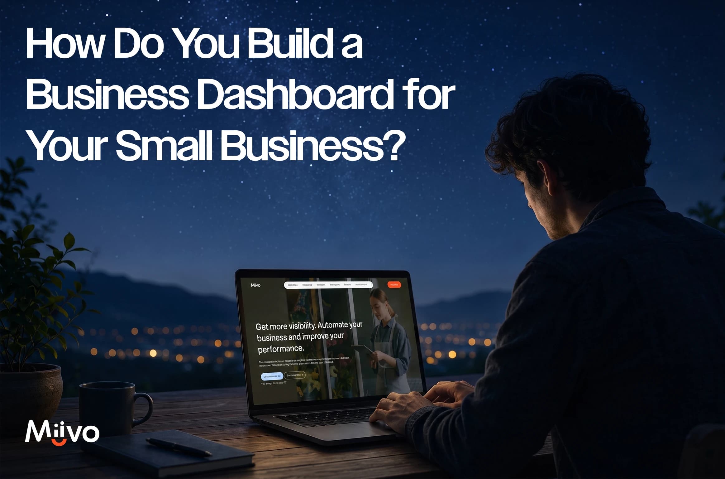 man building a business dashboard on laptop